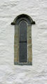 Aurland kyrkje, vindauge i vestfasaden, AMH 2005.jpg